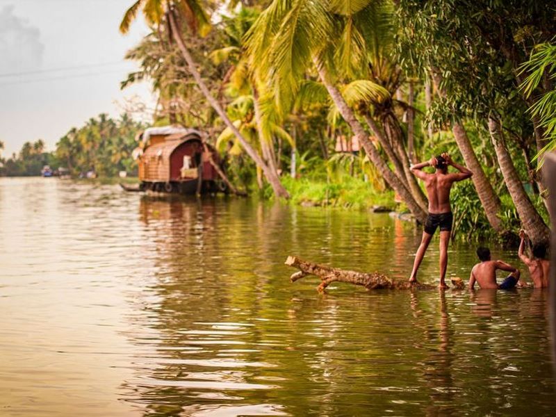 shallow-focus-of-people-on-the-river-surrounded