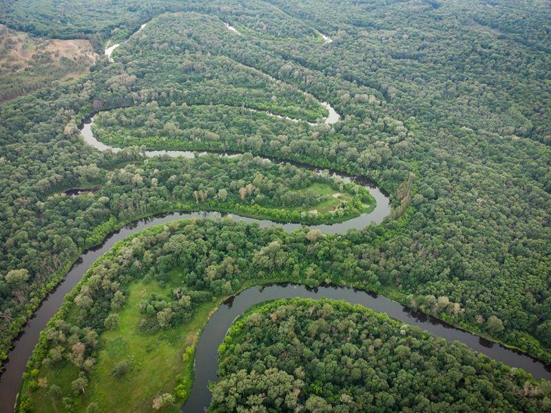 aerial-view-over-the-river-which-is-on-the-green